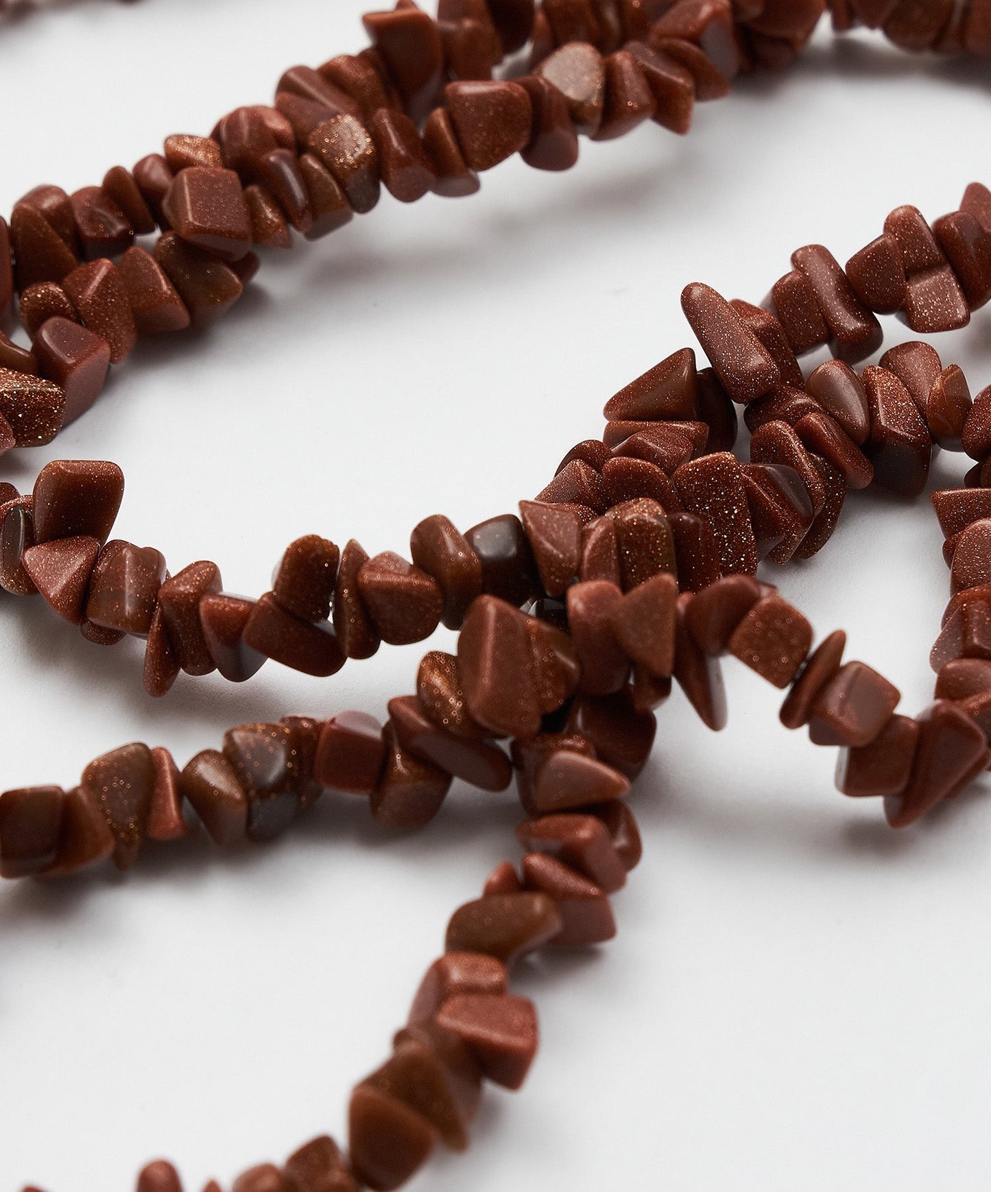 TIRA DE ESCALLA DE LLUVIA DE ORO-GOLDSTONE